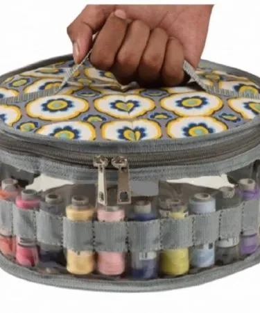 Stylish Sewing Organizer Bag with multiple compartments and elastic thread reel holders.