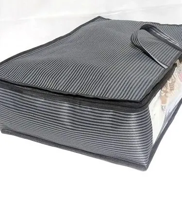 `High-quality washable Clothes Storage Bag from SardarCollections.com, available in multiple sizes.  Features a transparent window and durable rubber coating.