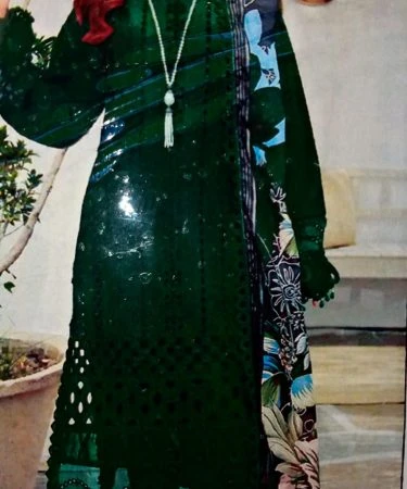 Elegant woman wearing a vibrant Chicken Kari 3-piece lawn suit, showcasing intricate Chikankari embroidery.