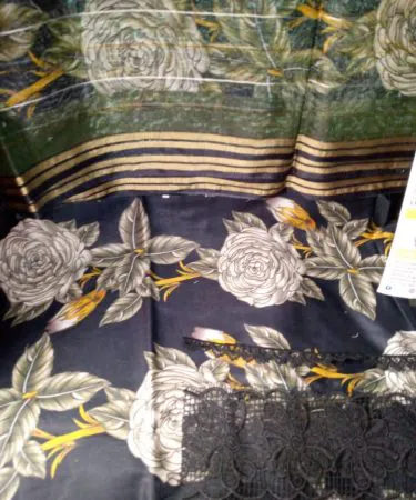 Stylish 3-piece lawn printed suit in vibrant summer color.