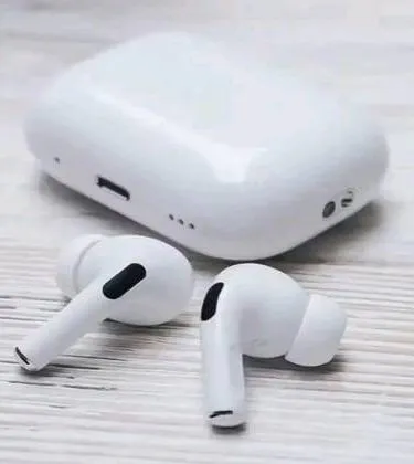 Apple AirPods Pro 2nd Generation wireless earbuds in white, showing the charging case open with two individual earbuds inside.