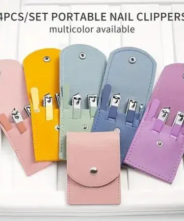 4pcs Premium Stainless Steel Manicure Pedicure Set with black storage bag, showcasing precision scissors, nail file, and other professional grooming tools.