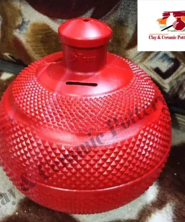 Colorful plastic money bank for kids, a gullak saving box, ideal for teaching children saving habits, available at Khareedo/Kharedo Pakistan.