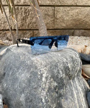 Gabbana Sunset Glow Reflectors polarized sunglasses shining brightly with a warm reflective lens effect, reducing glare and offering a stylish look.