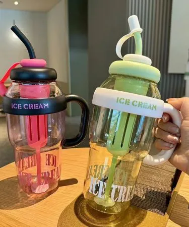 Pink Ice Cream Water Bottle with Infuser, featuring a playful ice cream cone design and a removable fruit infuser, ideal for healthy hydration.