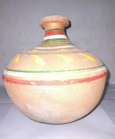 Large traditional clay money saving pot (Gullak) made from earthen terracotta, perfect for collecting savings and home decor.