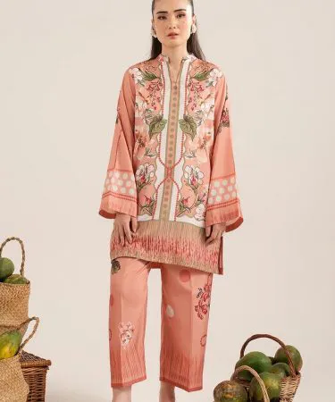 A stylish dark brown 2 Piece Cord Suit, featuring a textured corduroy fabric, worn by a model in a relaxed pose. The suit includes a jacket and trousers, highlighting its comfortable yet fashionable design, perfect for various occasions. Available with Khareedo's Cash on Delivery and open package policy in Pakistan.