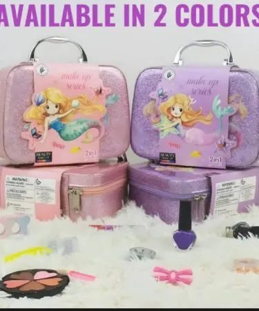 Sparkly pink or purple mermaid-themed 2-in-1 beauty and jewelry make-up set for girls in a zippered suitcase, featuring a vibrant mermaid graphic, with colorful play makeup, nail polish, and hair accessories visible.