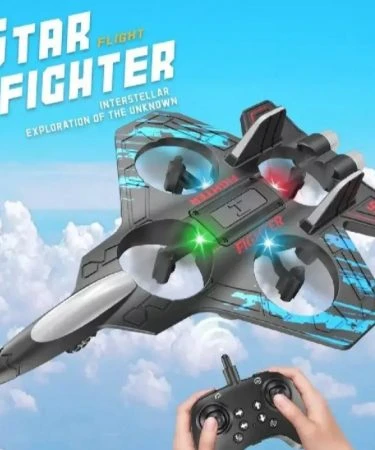 Star Fighter RC Jet Drone flying in air, blue and black remote control fighter aircraft with LED lights, EPP quadcopter performing a roll.