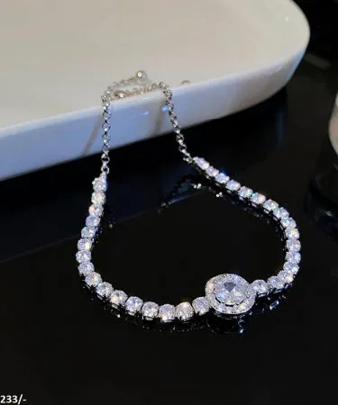 Silver plated adjustable round bracelet for women with sparkling zircon stones, perfect for casual, formal, or party wear.