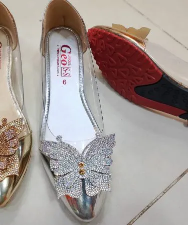 Khareedo SS Comfortable Flat Fancy Pumps in Silver, Golden, Rose Pink for women, sizes 36-41, with open package on delivery service.