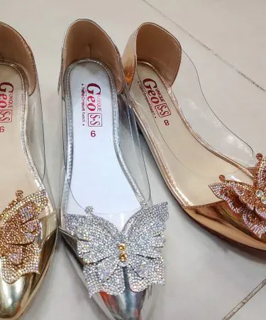 Khareedo SS Comfortable Flat Fancy Pumps in Silver, Golden, Rose Pink for women, sizes 36-41, with open package on delivery service.