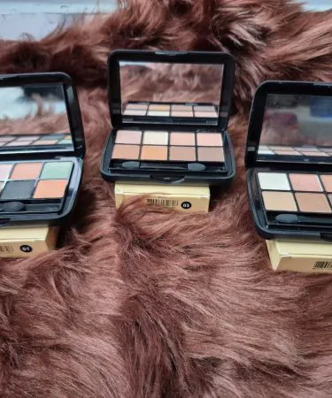 ANC MAC x Robert Lee Morris Makeup Kit with 3 Colour Eye Shadow Palette, Face Powder, Brush, and Puff for sale on Khareedo Pakistan with check on delivery service.