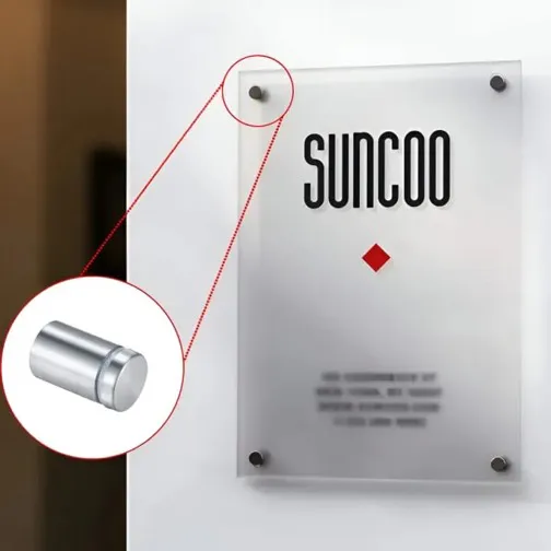 Close-up of four 1-inch stainless steel wall spacers, also known as glass standoff sign holders, designed for mounting acrylic, plexiglass, and mirrors, with a clear view of their advertising screw fixing mechanism.