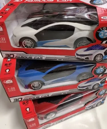 High-speed RC car with blue LED lights and spray exhaust effect, rechargeable remote control 3D racing car for kids, featured with sleek design and dynamic performance on Khareedo.pk.