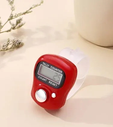 Digital Tasbih Finger Counter displaying different colors, ergonomic design for Zikr and prayer tally.