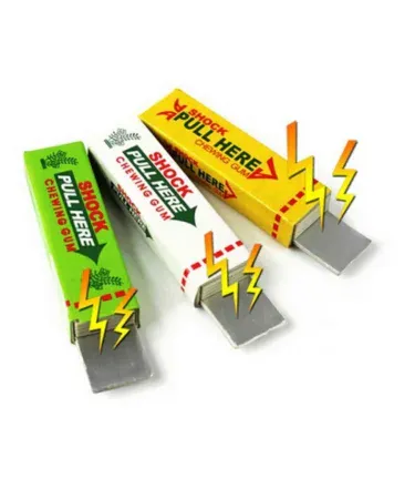 Three packs of classic shocking chewing gum in white, yellow, and green colors for pranks and jokes.