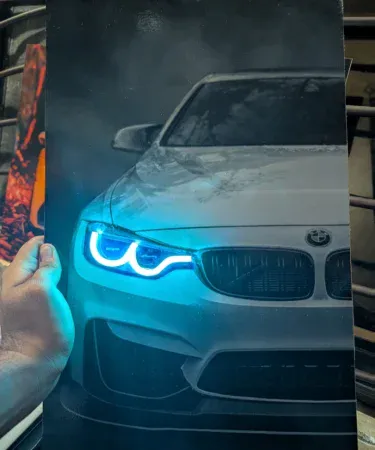 BMW Neon LED Light Poster 12x18 Inches for car lovers' room decor with vibrant blue LED glow and iconic BMW logo, perfect for garages, studios, and gamer setups bought from Khareedo and Kharedo.