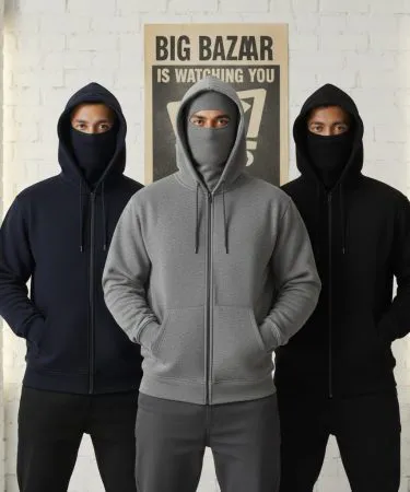 A male model wearing a navy blue balaclava hoodie made from soft winter fleece, showcasing the face covering feature and comfortable fit.