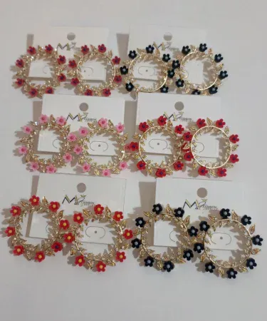 High quality multi colored ear hoops and studs set for girls, featuring various vibrant designs and patterns, available on Khareedo.pk with nationwide delivery.