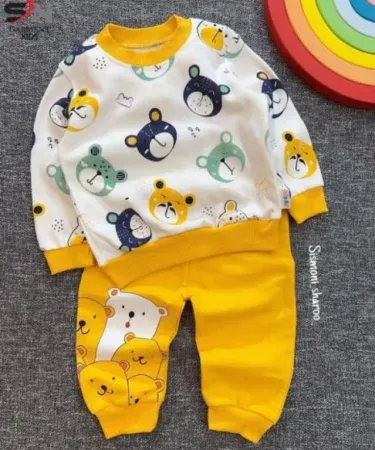 Image of a child wearing a 2-piece printed fleece hoodie tracksuit from the winter collection, showcasing the comfortable fabric and design.