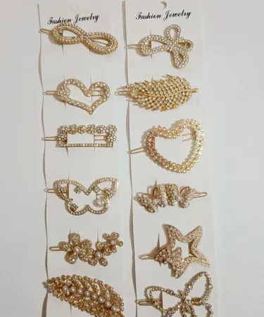 Close-up of elegant Golden Coloured Beautiful hair pins for girls, showcasing a radiant metallic finish and secure design, ideal for various hairstyles and available on Khareedo/Kharedo Pakistan.