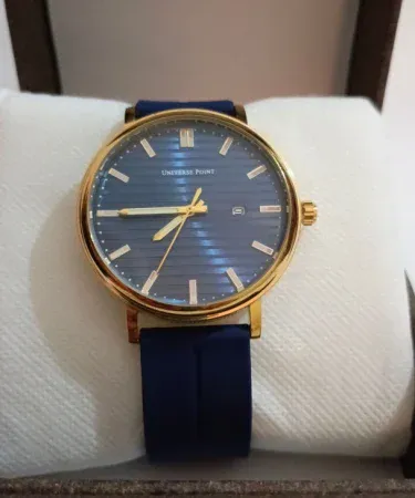 Premium men's wrist watch with a vibrant blue dial and matching blue strap, showcasing its elegant design and high quality.