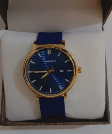 Premium men's wrist watch with a vibrant blue dial and matching blue strap, showcasing its elegant design and high quality.