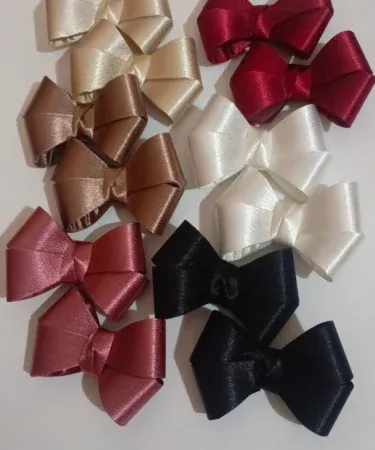 Pair of beautiful high-quality pink fabric hair bow pins for girls, ideal for styling kids' hair