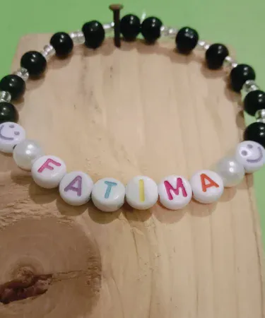 Stylish White Opal and Black Glass Beads Bracelet with Colorful Personalized Name Beads, available at Khareedo/Kharedo Pakistan with check on delivery service.