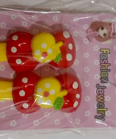 A vibrant collection of multi colored hair pins for girls, featuring various styles and bright hues, perfect as cheerful hair accessories for children.