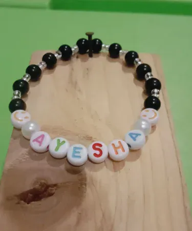 Stylish White Opal and Black Glass Beads Bracelet with Colorful Personalized Name Beads, available at Khareedo/Kharedo Pakistan with check on delivery service.