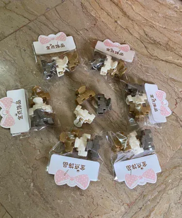 Pack of multicolored small hair claws for girls, vibrant mini hair clips, tiny hair accessories for women and kids available at Khareedo Pakistan