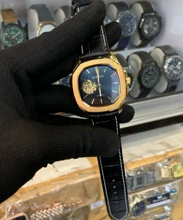 Luxury Bestwin Automatic Watch for men with leather strap, visible pendulum design, and premium gift packaging in elegant color.