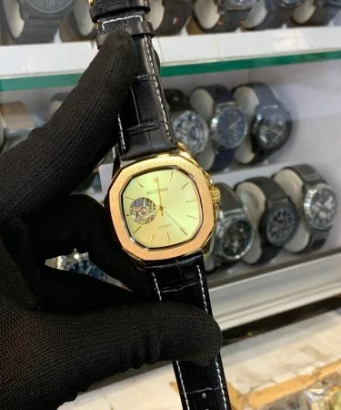 Luxury Bestwin Automatic Watch for men with leather strap, visible pendulum design, and premium gift packaging in elegant color.