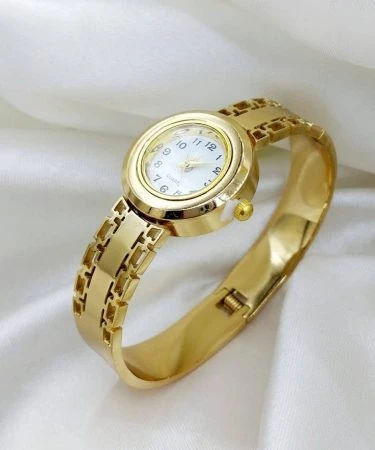 Elegant gold Ladies Bangle Watch for women, featuring a sleek and stylish design, perfect for adding a touch of luxury to any outfit. Available with Khareedo's check on delivery service in Pakistan.