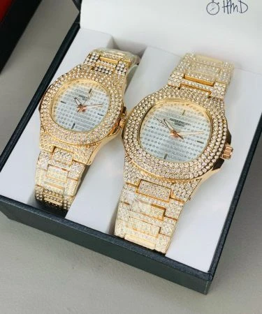 Patek Philippe Pair Watch Copper with full stone case and chain, luxury couple watches featuring a butterfly master lock, premium quality replica for men and women, available for check on delivery in Pakistan.