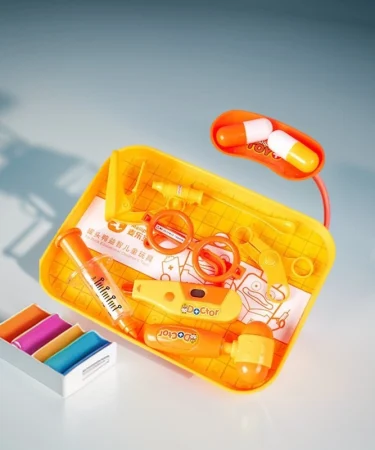 Junior Doctor Set for Kids with realistic medical tools, stethoscope, syringe, and thermometer, encouraging imaginative pretend play for aspiring health superheroes.