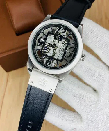 Gents Date Just Skeleton Dial Watch with good quality brown strap and visible automatic movement - Premium men's wristwatch available on Khareedo Pakistan