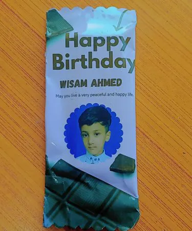 ** An assortment of delicious customised chocolates featuring various personalized designs, logos, and messages for gifts, events, and branding.