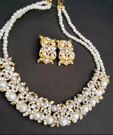 White Pearl Jewelry Set for Women, featuring a multi-strand necklace and matching drop earrings, elegant bridal fashion accessories from Khareedo.