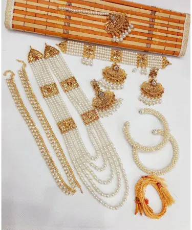 ALL IN ONE DEAL pearl choker jewelry set with matching malla payal and bangles, featuring lustrous white pearls and intricate design, ideal for Pakistani weddings and traditional events.