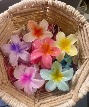 Pack of 2 large Hawaiian Plumeria flower hair claws with strong non-slip grip, ideal for summer beach headwear for women and girls with thick or thin hair