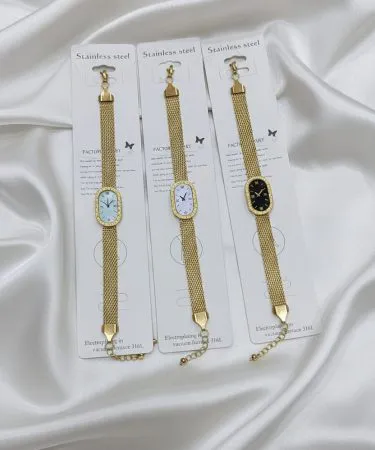 Stylish gold-tone fake watch bracelet with intricate design and replica watch face, available on Khareedo|Kharedo Pakistan with Check on Delivery.