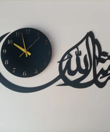 Elegant Masha Allah Islamic Calligraphy Wall Clock in black and gold finish, showcasing intricate design and premium quality, ideal for modern Islamic home decor.