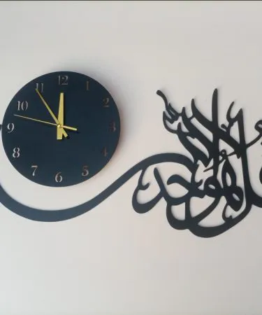 Surah Ikhlas Islamic Wall Clock featuring elegant Arabic calligraphy and a beautiful design, ideal for Muslim home decor and prayer areas, made with durable materials.