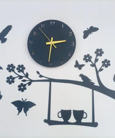 Modern Islamic Wall Clock with elegant Allah and Muhammad calligraphy, black frame, for peaceful home decor and spiritual ambiance.