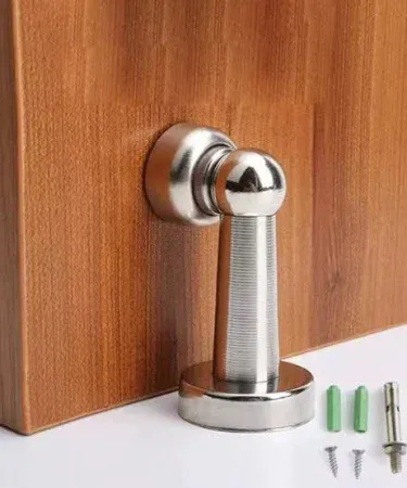 Sleek, modern stainless steel door stopper protecting a wooden door from hitting a wall, showcasing its best quality and universal design.