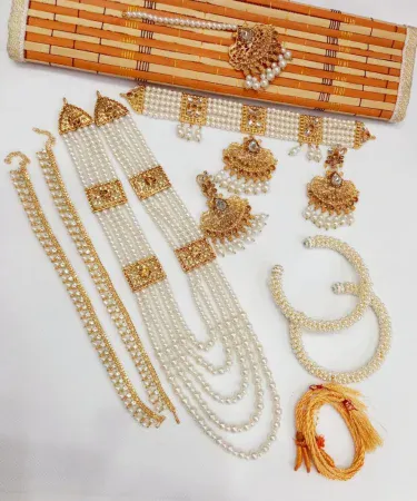 ALL IN ONE DEAL pearl choker jewelry set with matching malla payal and bangles, featuring lustrous white pearls and intricate design, ideal for Pakistani weddings and traditional events.