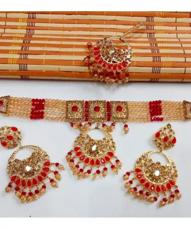 Stunning new beautiful design Indian jewelry set (Ù†ÛŒØ§ Ø®ÙˆØ¨ØµÙˆØ±Øª ÚˆÛŒØ²Ø§Ø¦Ù† Ø§Ù†ÚˆÛŒÙ† Ø²ÛŒÙˆØ±Ø§Øª Ú©Ø§ Ø³ÛŒÙ¹) by Khareedo, featuring intricate patterns, sparkling stones, and traditional craftsmanship. Perfect for weddings, parties, and festive occasions.